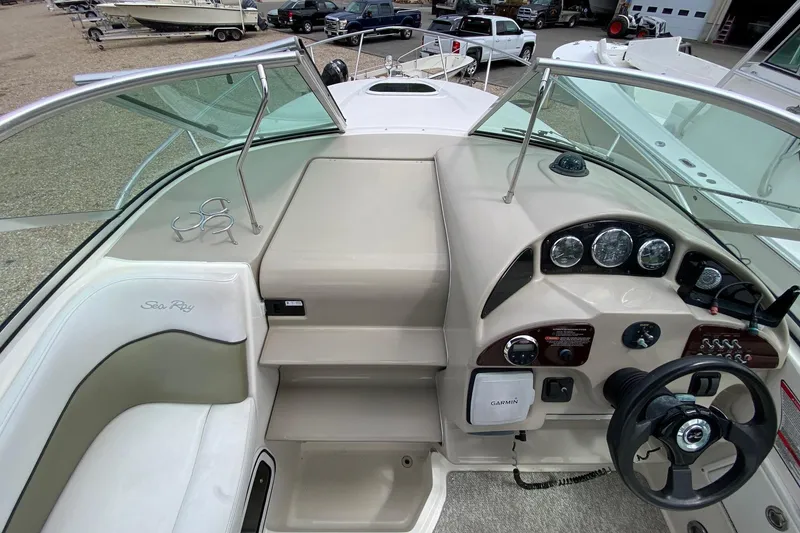 Slide: The Image of Engine compartment of a 2007 Sea Ray 260 Sundancer boat, showcasing mechanical components. - 31