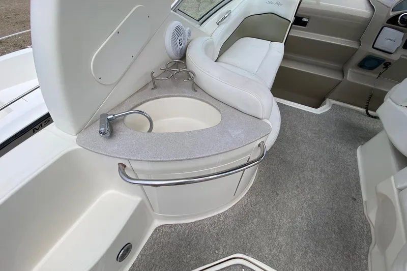Slide: The Image of 2007 Sea Ray 260 Sundancer interior with sink and seating area. - 35
