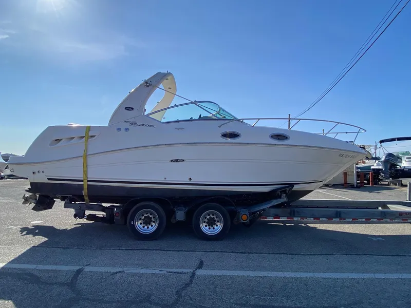 Slide: The Image of Dashboard view of a 2007 Sea Ray 260 Sundancer boat on open water. - 4