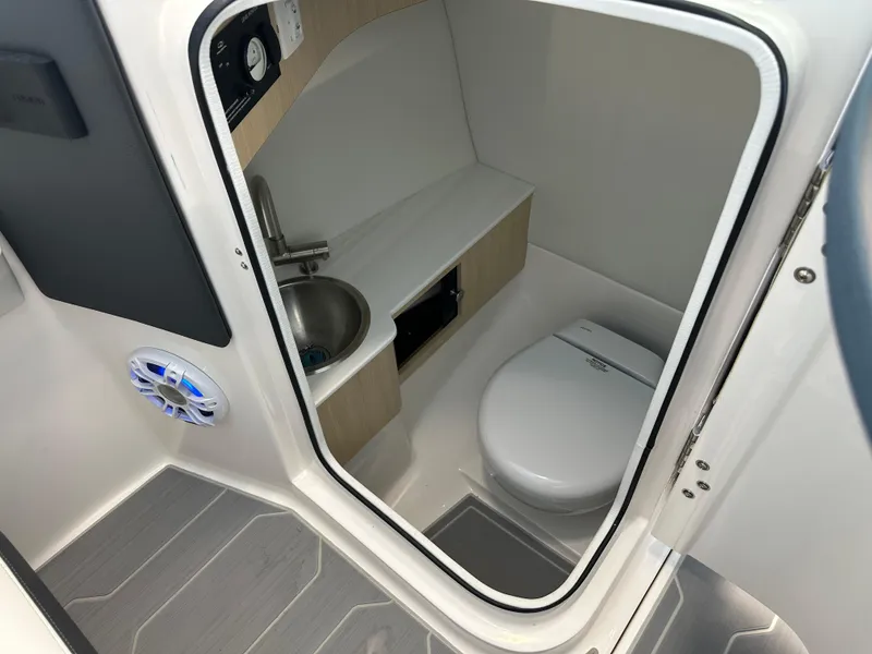 Slide: The Image of 2025 Regal LX6 boat features and pricing list with various options and accessories. - 15