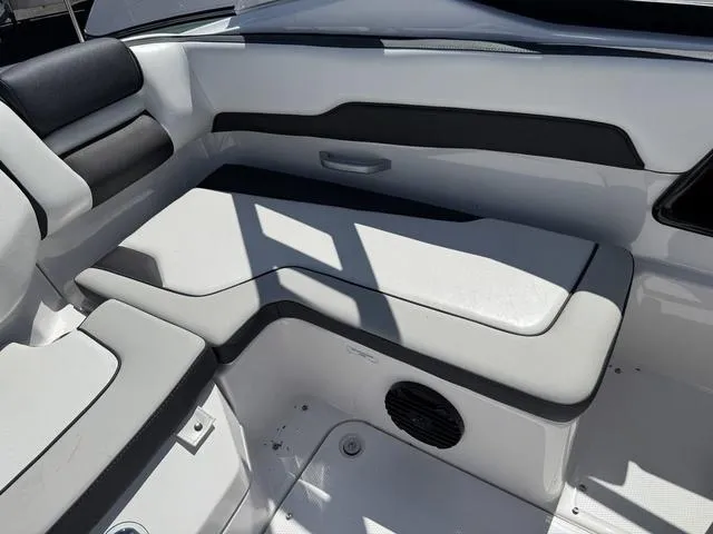 Slide: The Image of 2024 Yamaha Boats 195S interior seating with sleek, modern design and comfortable upholstery. - 17