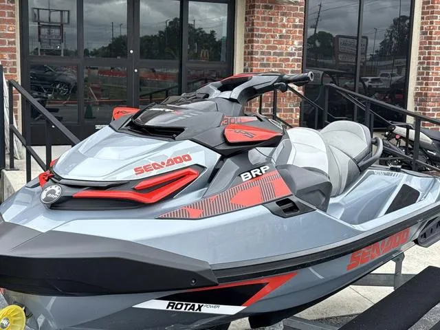 Slide: The Image of 2018 Sea-Doo Waverunner PW RXT-X 300 displayed outside a building. - 4