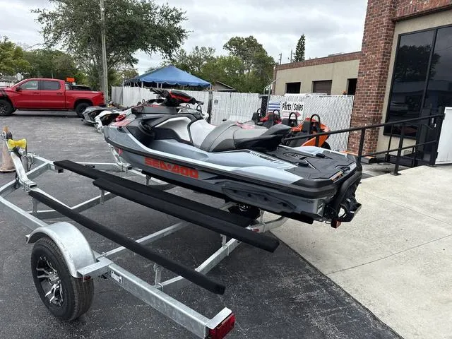 Slide: The Image of 2018 Sea-Doo Waverunner PW RXT-X 300 on trailer, parked outdoors. - 5