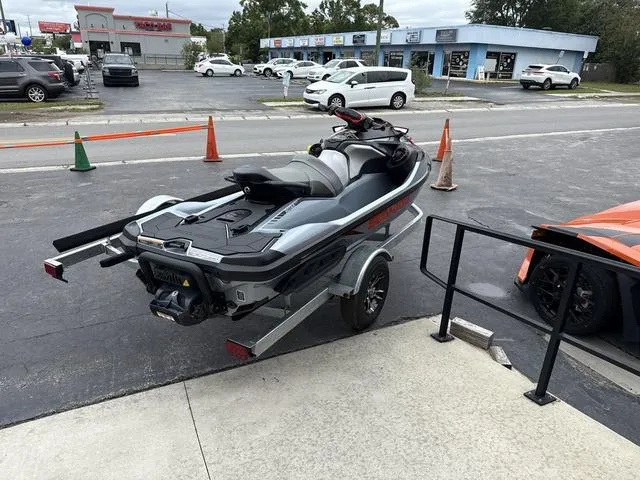 Slide: The Image of 2018 Sea-Doo Waverunner PW RXT-X 300 on trailer in parking lot. - 8
