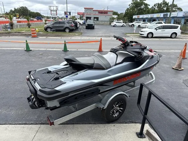 Slide: The Image of 2018 Sea-Doo Waverunner PW RXT-X 300 on trailer in parking lot. - 9