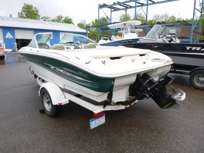 Slide: The Image of 2005 Sea Ray 185 Sport boat on trailer, parked outdoors. - 3