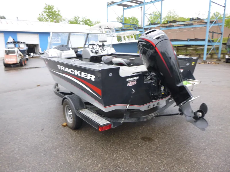 Slide: The Image of 2011 Tracker Targa V-18 WT boat with outboard motor on a trailer. - 3