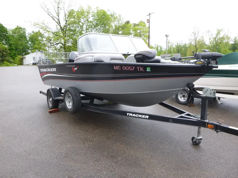 Slide: The Image of 2011 Tracker Targa V-18 WT boat on trailer in parking lot. - 5