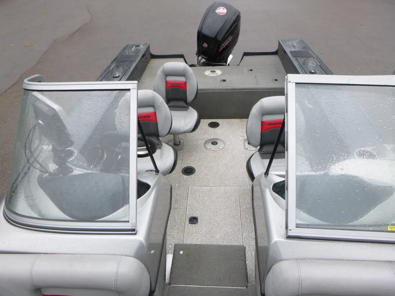 Slide: The Image of 2011 Tracker Targa V-18 WT boat interior with seating and windshield. - 7