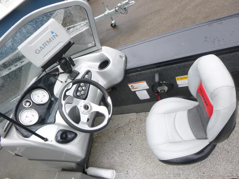 Slide: The Image of 2011 Tracker Targa V-18 WT boat cockpit with Garmin navigation system and comfortable seating. - 8