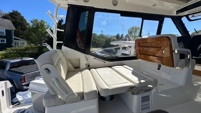 Slide: The Image of 2025 Boston Whaler 405 Conquest interior with luxurious seating and modern design. - 28