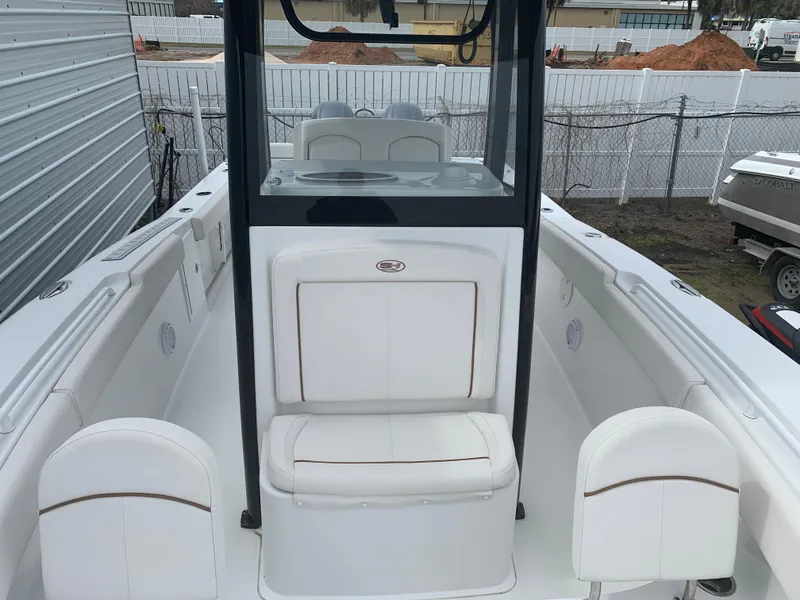 Slide: The Image of 2020 Sea Hunt Gamefish 27 Forward Seating boat with white interior and center console. - 14