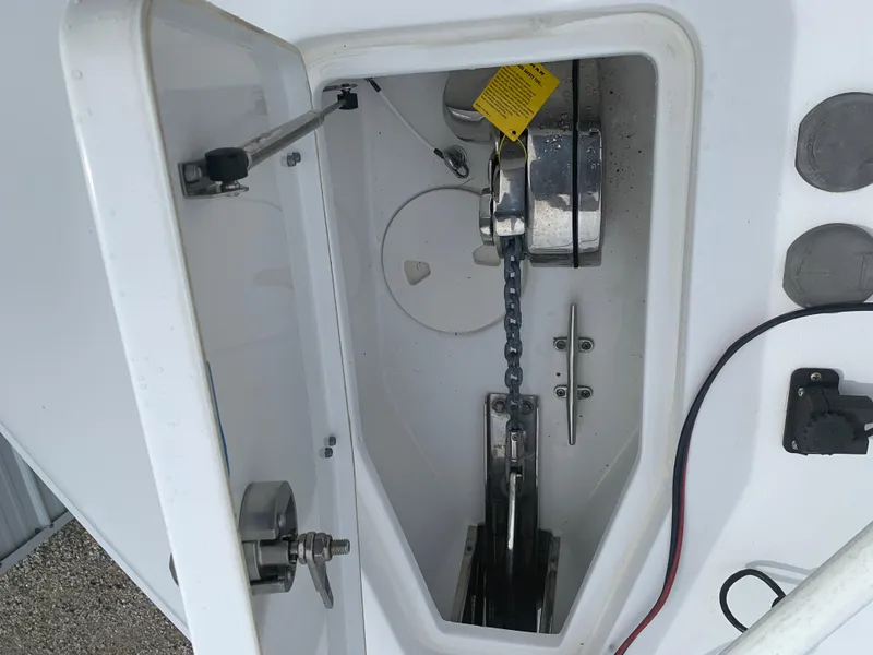 Slide: The Image of Anchor compartment of 2020 Sea Hunt Gamefish 27 Forward Seating boat. - 19