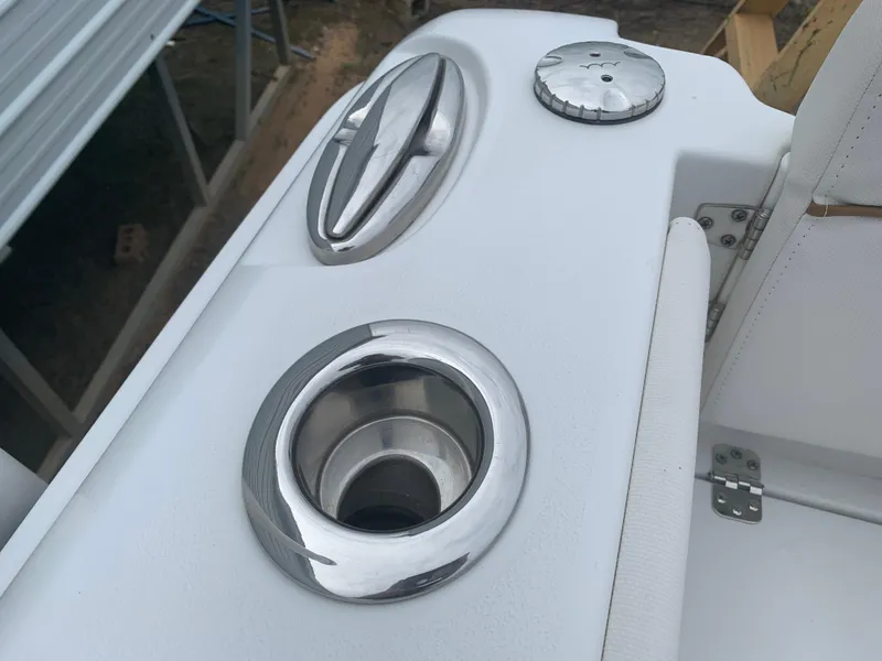 Slide: The Image of 2020 Sea Hunt Gamefish 27 boat detail with stainless steel cup holder and fittings. - 22