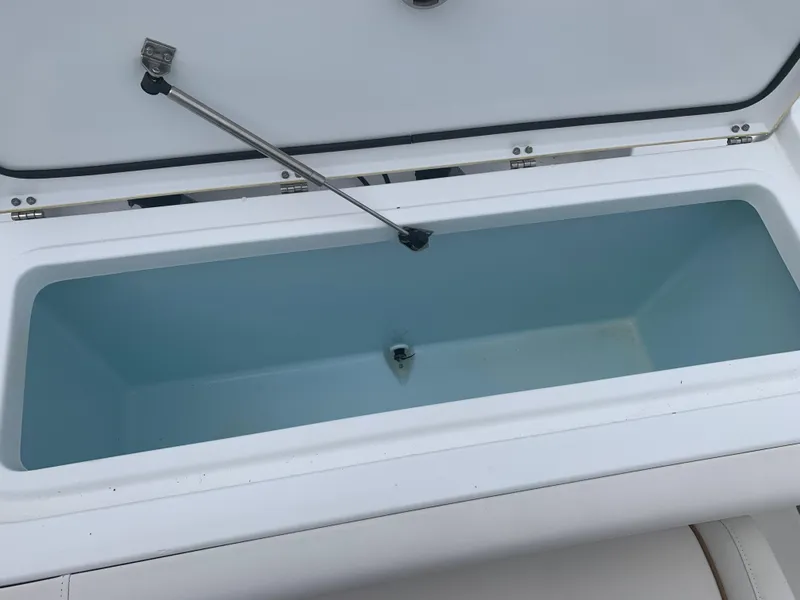 Slide: The Image of Open storage compartment on 2020 Sea Hunt Gamefish 27 Forward Seating boat. - 5