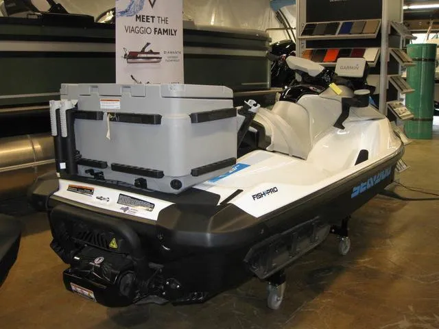 Slide: The Image of BRP FISHPRO SCOUT 130 W/ IDF, WHITE/GULF STREAM BLUE 2024 - 2