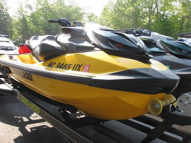 Slide: The Image of BRP RXPX 300, TECH PKG, MILLENIUM YELLOW 2023 - 2