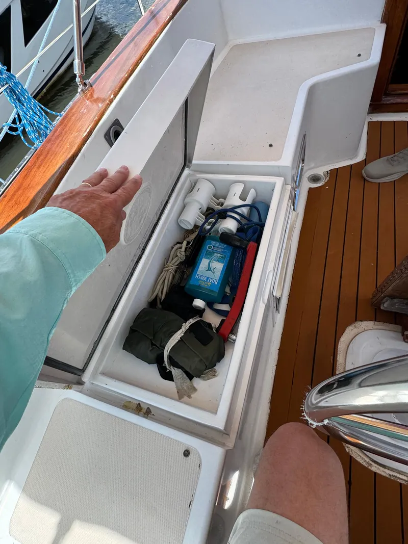 Slide: The Image of Storage compartment on a 1981 Gulfstar 44 sailboat, containing ropes and equipment. - 20