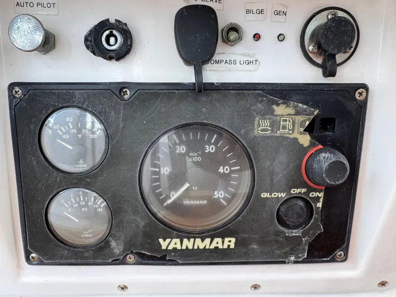 Slide: The Image of Control panel of a 1981 Gulfstar 44 boat with Yanmar engine gauges. - 22