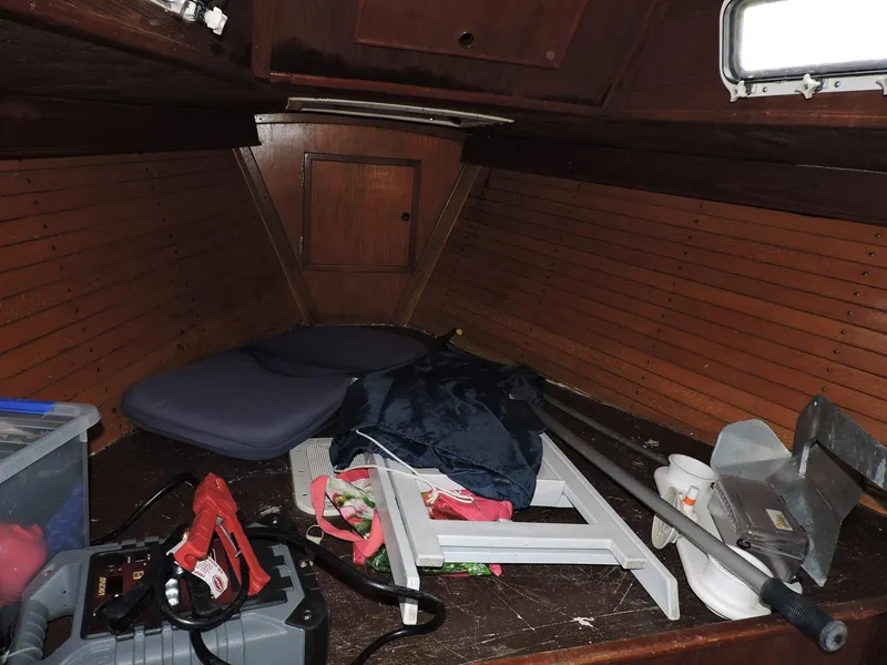 Slide: The Image of Interior of 1982 Custom Wings 33 Ketch with tools and equipment scattered. - 6
