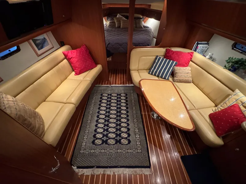Slide: The Image of Luxurious interior of 2004 Tiara Yachts 3600 Sovran with elegant seating and decor. - 15