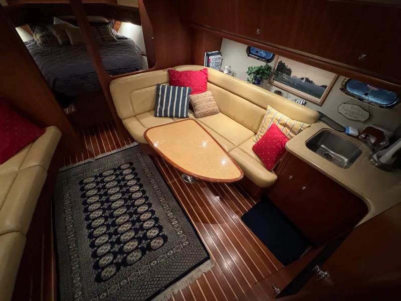 Slide: The Image of Luxurious interior of 2004 Tiara Yachts 3600 Sovran with cozy seating and elegant decor. - 18