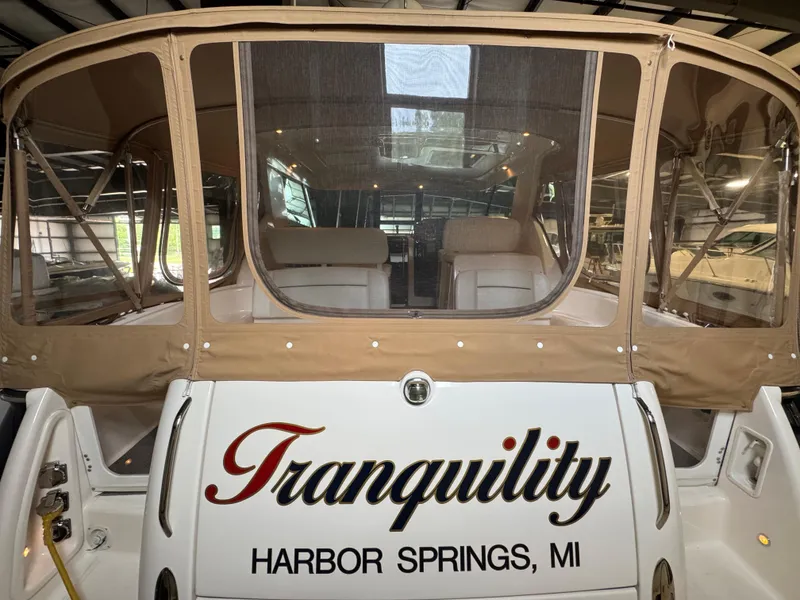 Slide: The Image of 2004 Tiara Yachts 3600 Sovran named "Tranquility" docked in Harbor Springs, MI. - 2