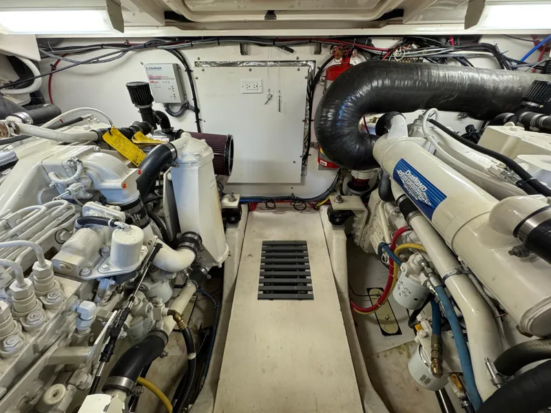 Slide: The Image of Engine room of a 2004 Tiara Yachts 3600 Sovran, showcasing mechanical components and systems. - 36