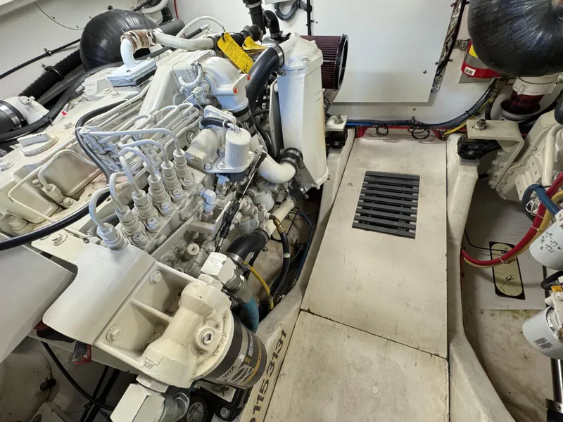 Slide: The Image of Engine room of a 2004 Tiara Yachts 3600 Sovran, showcasing mechanical components. - 37