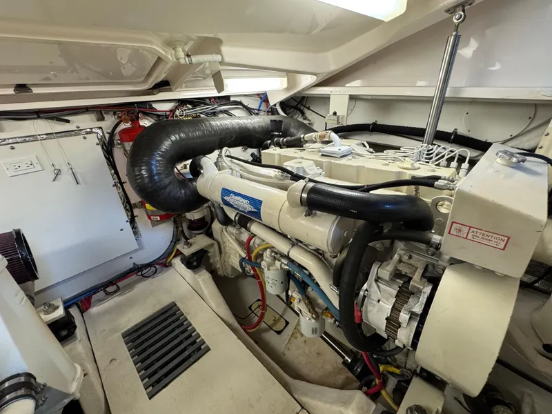 Slide: The Image of Engine room of 2004 Tiara Yachts 3600 Sovran, showcasing detailed mechanical components. - 38