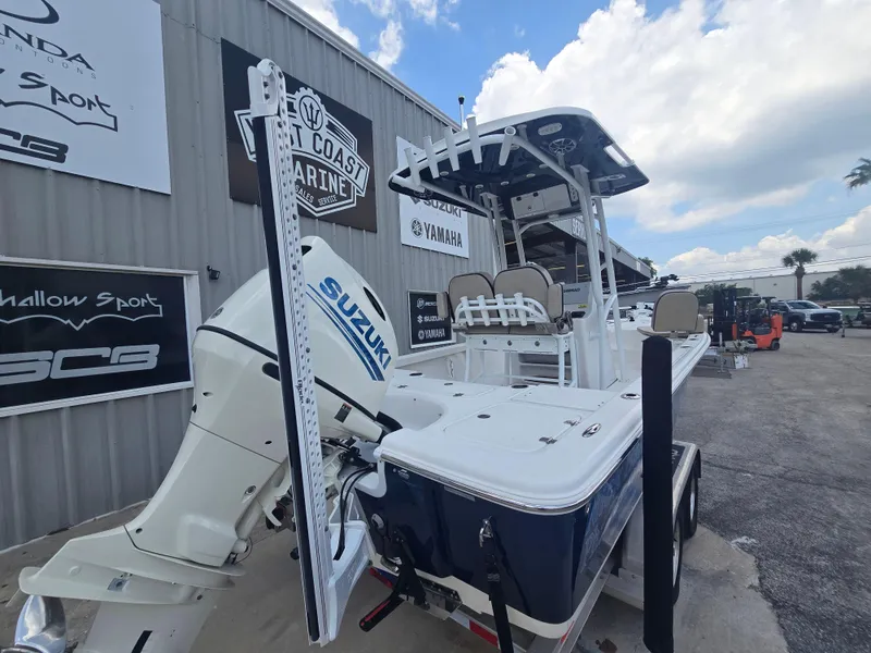 Slide: The Image of 2021 Sea Pro 228 Bay boat with Suzuki engine at West Coast Marine dealership. - 11