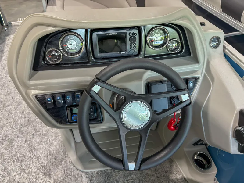 Slide: The Image of Steering console of 2025 Trifecta 22 RF LE boat with gauges and controls. - 10