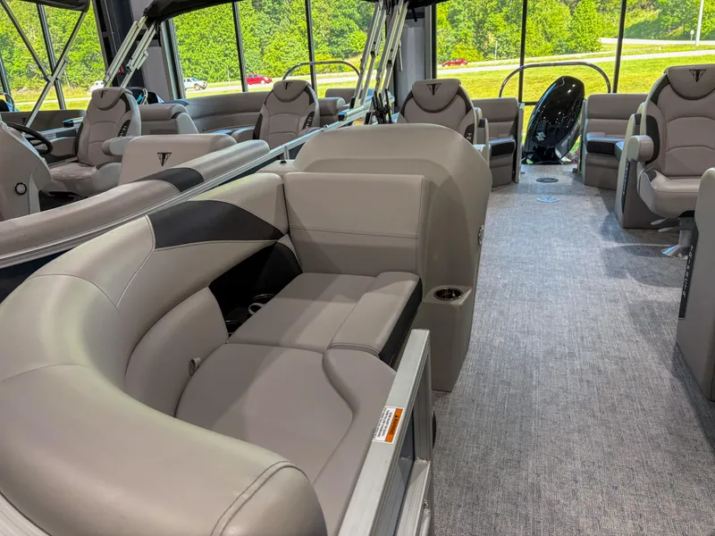 Slide: The Image of Luxurious interior of 2025 Trifecta 22 RF LE pontoon boat with plush seating. - 4