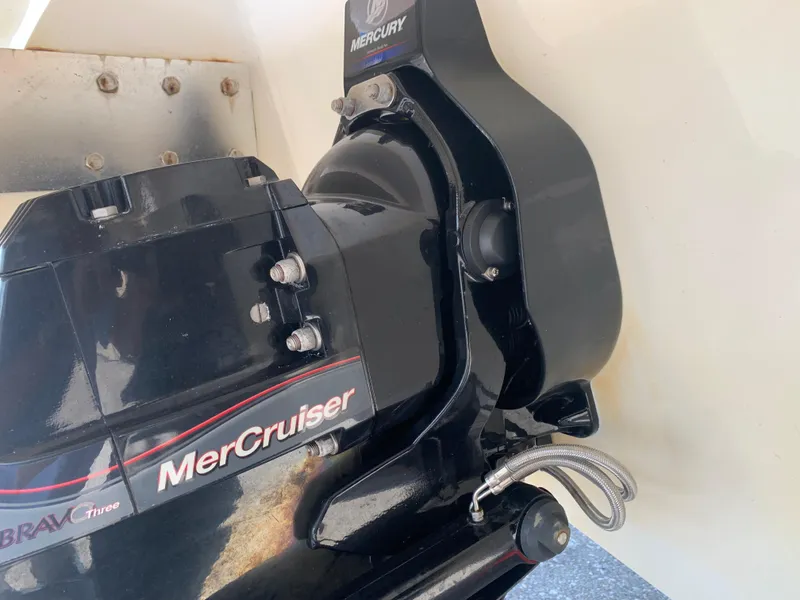 Slide: The Image of MerCruiser engine component on a 2014 Cobalt 302 boat, featuring Bravo Three drive. - 6