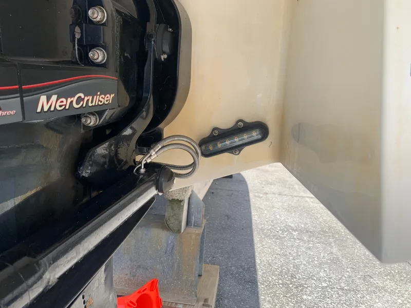 Slide: The Image of Close-up of a 2014 Cobalt 302 boat's MerCruiser engine component. - 7