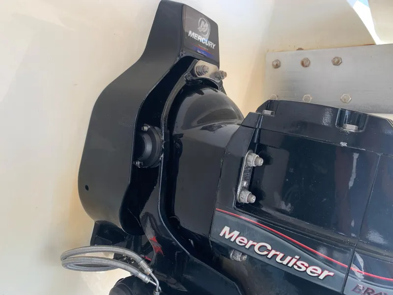 Slide: The Image of Mercury MerCruiser engine on 2014 Cobalt 302 boat, close-up view. - 8