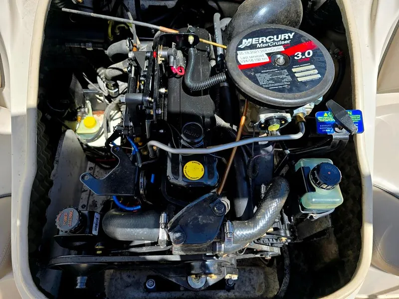 Slide: The Image of 2003 Sea Ray 176 SRX BR boat engine, featuring a Mercury MerCruiser 3.0 motor. - 10
