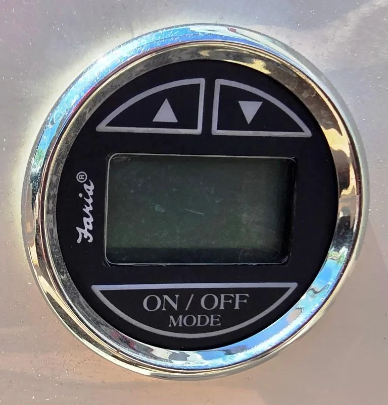 Slide: The Image of Digital control panel on a 2003 Sea Ray 176 SRX BR boat. - 12