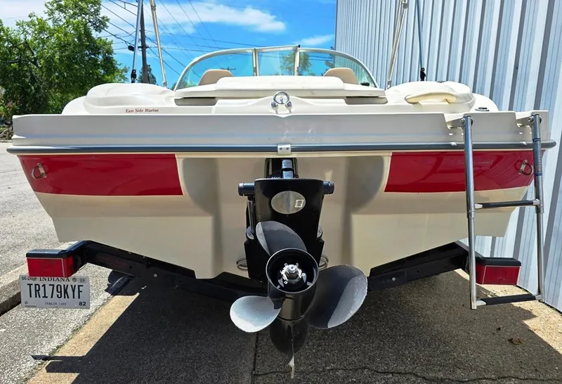 Slide: The Image of Rear view of a 2003 Sea Ray 176 SRX BR boat with outboard motor. - 7