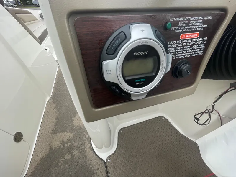 Slide: The Image of Sony audio system on 2012 Sea Ray 260 Sundeck boat dashboard. - 22