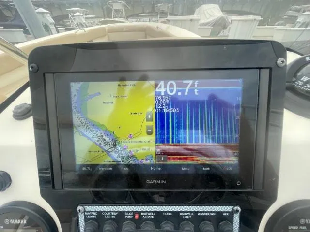 Slide: The Image of Garmin navigation display on 2022 Scout Sport 195 Dorado boat, showing depth and map. - 12