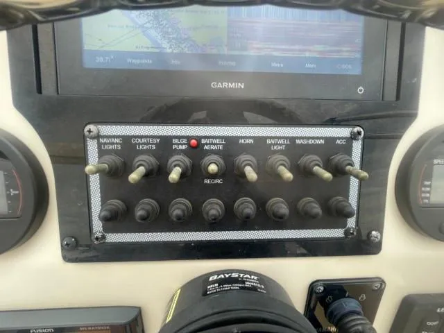 Slide: The Image of Control panel of a 2022 Scout Sport 195 Dorado boat with Garmin display. - 13