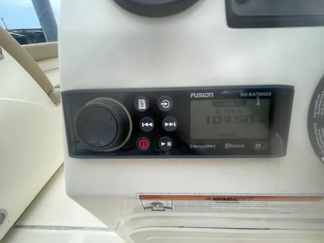 Slide: The Image of Fusion stereo system on 2022 Scout Sport 195 Dorado boat dashboard. - 17