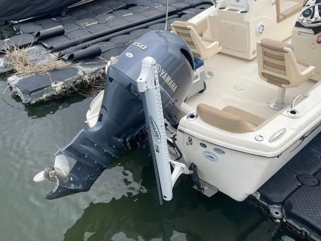 Slide: The Image of 2022 Scout Sport 195 Dorado boat with Yamaha outboard motor docked in water. - 5