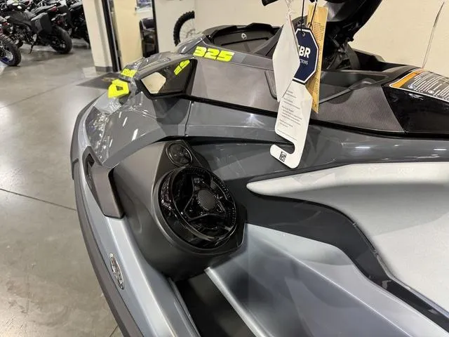 Slide: The Image of 2025 Sea-Doo Waverunner RXT-X in showroom, featuring sleek design and modern details. - 10