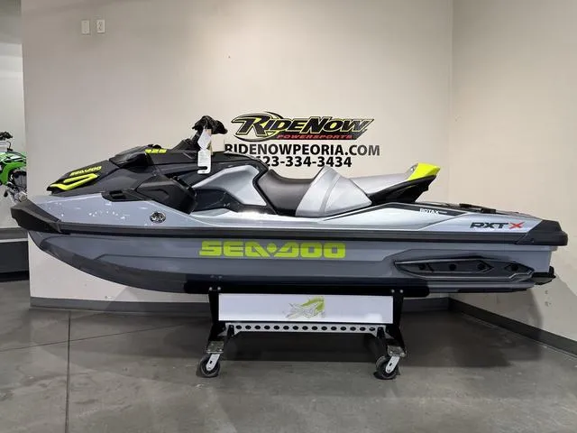 Slide: The Image of 2025 Sea-Doo Waverunner RXT-X on display at RideNow Peoria showroom. - 2