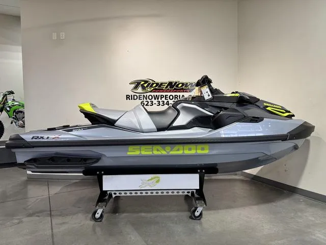 Slide: The Image of 2025 Sea-Doo RXT-X Waverunner displayed indoors on a stand. - 4