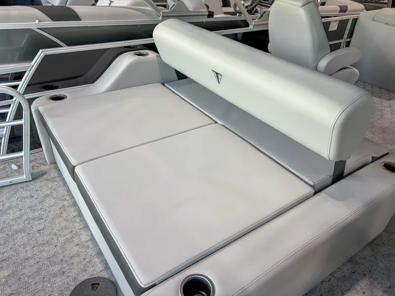 Slide: The Image of 2025 Trifecta 24 UL LE boat interior with gray seating and cup holders. - 10