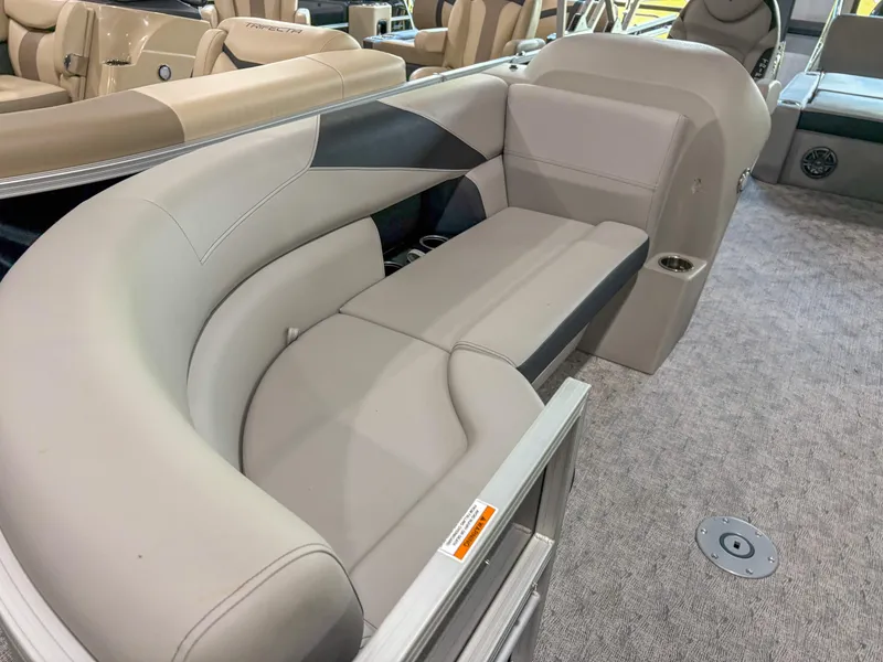Slide: The Image of 2025 Trifecta 24 UL LE pontoon boat interior with plush seating and modern design. - 3