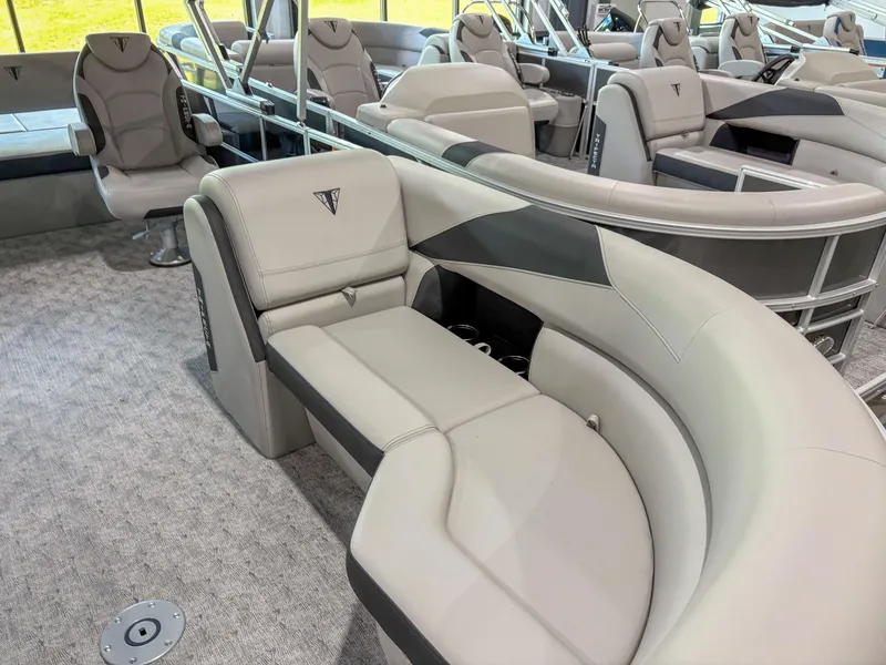 Slide: The Image of Luxurious interior of 2025 Trifecta 24 UL LE pontoon boat with plush seating. - 4